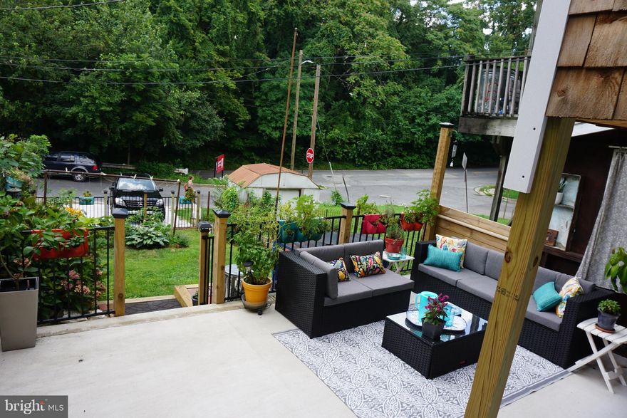 The ONE you have been waiting for! Unique City Setting.  Super Large Floor plan & Rooms.  City access surrounded by Nature! Renovated 2011 keeping historic charm.  New Appliances! Furnace & Air 2014. Tankless Water Heater 2015!  Washer, Dryer, Stove & Dishwasher 2016. 2 Car  Parking Pad.  MUST SEE!  Park the car and walk to restaurants, shopping, etc. Beautiful Kitchen With Center Island.  Fenced Yard backing woods,   Enclosed Porch & Rear Patio. 4 Levels of Living Space.  Beautifully Maintained.  The attached property has transferred owners the work to start to make it Beautiful begins on April 1st and should be completed within 8 weeks from then.  Roofer to fix missing shingles from last storm and will inspect to be sure the roof is in good condition.