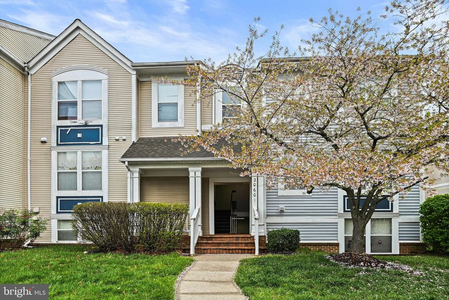 20601 Cornstalk Terrace #202 has had a fantastic renovation just for you!  Just one short flight of stairs up brings you to this corner unit Tahoe model on the 2nd floor flooded with natural light.  You will find this 2 bedroom/2 bath split wing floor plan with 1183 square ft and 2 balconies to be a real winner!   Views of the fountain and pond from both balconies- one is a wrap-around- offer peace and tranquility.  In the center of the condo, you will find a large living room, dining room and kitchen, along with a convenient laundry closet.  The fully upgraded kitchen has all the buzzwords- white cabinetry, granite countertops, and plenty of them, brand new stainless steel appliances with gas cooking, and a pantry.  Notice the plush carpet in the 2nd bedroom and rich dark LVP flooring throughout the main living areas and primary bedroom.  Both bathrooms are freshly updated and upgraded and each offers access from each bedroom.  Like having two primary suites- great for home-sharing!   Utilities are all located in a room accessed from either balcony. Comes with 1 Assigned parking space right out front, a secure storage room  and plenty of guest parking.   All this and more being inside the desirable community of Ashburn Village with all of the amenities of the HOA, the Sports Pavilion, multiple lakes, and miles of trails.  The location cannot be beaten as you are just across the street from Ashburn Village Shopping Center with great restaurants, a grocery store, shops, and public EV chargers.  Come see for yourself why living in Lakeshore Condos at Ashburn Village is calling your name! **Exteriors of buildings are undergoing renovations**