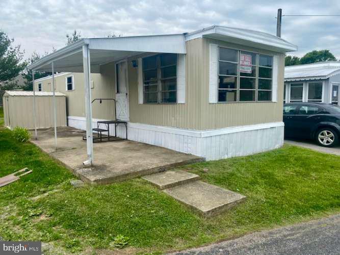 Mobile home for sale in a well maintained park. Available Immediately! Fresh paint throughout. All new laminate Plank flooring. 2 bedroom, 1 bath, nice refrigerator and gas stove included, forced hot air gas heat, washer/dryer hookup, outside storage shed, off street parking, 95 gallon trash toter included, nice yard, professionally managed. This home backs right up to the township park and community center with a walking trail (Fit Trail), playground, sports fields, library, etc. Conveniently located 1 mile from pharmacy, fast food, grocery, etc. 4 miles from Route 30, Walmart, Lowes, and West Manchester Mall. Great Location!!Tenant is responsible for utilities. Gas and Electric bills to be put in the tenants name. Water/Sewer/Trash stays in the Landlords name and will be billed back to Tenant. We look forward to hearing from you!!