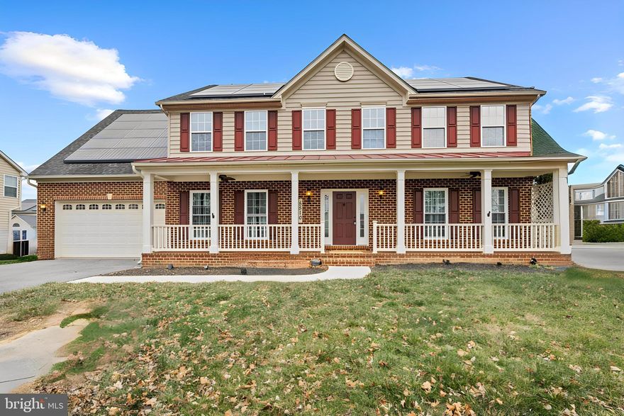 NEW PRICE! OPEN HOUSE SUNDAY 2/22 - 11:00-1:00! Welcome to 5510 Doubs Rd—an exceptional Adamstown Commons home offering over 4,500 total finished square feet, thoughtful 2025 updates, and a highly desirable location with abundant community green space. This full brick-front home has been beautifully refreshed with a partial remodel in 2025, including a complete new stainless appliance package, new carpet on lower level, refinished hardwoods on main level, and fresh paint throughout the entire home. The kitchen shines with a nice breakfast room, island, new stainless appliances, and major system upgrades include a 2024 natural gas furnace and AC unit plus new first-floor replacement windows for improved comfort and efficiency. The leased solar panels help keep the average energy bill around only $100 per month, an incredible bonus. Offering 4 bedrooms with the potential for a 5th bedroom in the finished lower level, along with 3 full baths and 1 half bath, this home provides a versatile layout perfect for both everyday living and entertaining. The lower level also features excellent bonus spaces for family fun, recreation, hobbies, or extended living needs, plus an office, dedicated workshop and storage area. Step outside to enjoy multiple outdoor amenities, including a low-maintenance Trex deck, aluminum fencing, and raised vegetable garden. Relax on the covered front porch, overlooking the community where this home was proudly built by the original, first homeowners in the neighborhood, situated directly beside the former model home. This community is known for its expansive green open spaces, playground, and walking/jogging paths, creating an ideal setting for both recreation and relaxation. Beautiful updates, efficient systems, generous square footage, and a premier location—5510 Doubs Rd offers the perfect blend of comfort and convenience. Seller will credit Buyer $3,000 upon full price offer towards new countertops.