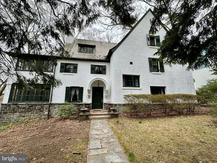 Welcome to this  timeless gem built in 1907 that seamlessly will blend classic charm with your added modern conveniences. Nestled on a generous 0.32-acre private lot, this residence boasts an impressive 8 Bedrooms, 5 Baths with 5,154 square feet of finished living space plus 2,028 sq ft in the basement, offering endless possibilities for your customization and design. Discover your blank canvas to create a world of elegance, where  hardwood floors, custom moldings, fireplaces and multiple living levels  will provide an inviting atmosphere with plenty of room for everyday living, family gatherings and entertaining.  The multiple sunroom/conservatories and enclosed balcony/porches on each level provide plenty of space to retreat to relax and unwind.  The kitchen awaits your vision/design to include the formal butlers pantry !  The interior layout is thoughtfully designed, featuring additional stairways and ample storage, including cedar closets and walk-in spaces. The basement offers a walkout level with potential for additional rooms, half bath, and attached garage space. Situated at the end of a street,  outside the property is adorned with charming neighborhood sidewalks and serene surroundings.  This property is not just a home; it's a lifestyle. With its architectural elegance and spacious design, it presents a unique opportunity to create your dream residence in a coveted location. Don’t miss your chance to own this exquisite Colonial treasure!