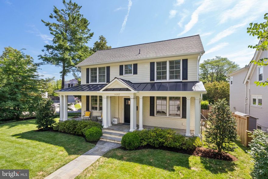 Battery Park, Bethesda | 8013 Maple Ridge Road | A Classic Reimagined

Move-in ready, in the perfect downtown Bethesda location, welcome to 8013 Maple Ridge Road, Bethesda. Tucked on a tree-lined heart of Battery Park, where sidewalks lead to tennis matches, downtown brunches, and the Metro, this classic Colonial was reimagined from the studs up in 2017 to deliver timeless character with modern comfort.

Step inside to discover the just-right-sized house: four bedrooms, four-and-one-half baths, and no wasted space. Taking advantage of the ideal urban-yet-suburban leafy-green lot, the home's floorplan celebrates connections of life inside and out.

Formal entry from the gorgeous front porch? Check. Muddy boots and worn-out pups spilling into the back mudroom? Check! Whatever your lifestyle, or guest event, the home can handle it with style and grace.

The open-concept kitchen and family room are soaked in natural light, ideal for casual mornings or lively evenings. The kitchen is outfitted with today's fixtures and finishes - stainless steel appliances, an island with quartz countertops, designer lighting, and custom tile accents. The family room is smartly designed for game nights around the table or movie-watching in front of the fireplace. The adjacent mudroom just off the driveway and the jewel-box powder room on the main level keep life convenient and clutter-free.

Upstairs, the spacious primary suite is a true retreat, with a spa-like bath, walk-in closet, and laundry on the same level (because you do deserve it all). Two additional bedrooms with large closets and private en suite baths. Downstairs, the fully finished lower level with private entrance offers flex space with the fourth bedroom, updated full bath, and light-filled rec room perfect for guests, work, or play.

Peace-of-mind is guaranteed with the updates throughout - replacement windows, flooring, newer appliances, HVAC, central air, and new roof (2017 & 2025) - making sure life is easy from day one. And outside? The inviting front porch, along with the private bluestone patio out back and mature gardens, is ready for lemonade-sipping, cocktail-hour lounging, and everything in between.

Just blocks to Bethesda Metro, the clubhouse and tennis courts of Battery Park, and all the shops, dining, and entertainment of Bethesda Row. Inbound for Bethesda Elementary, Westland Middle, and B-CC High School, and minutes to NIH, Suburban Hospital, and Walter Reed.

8013 Maple Ridge Road isn’t just turnkey. It’s the rare combination of charm, location, and modern living that buyers wait all year for. Make this your move-in moment.
