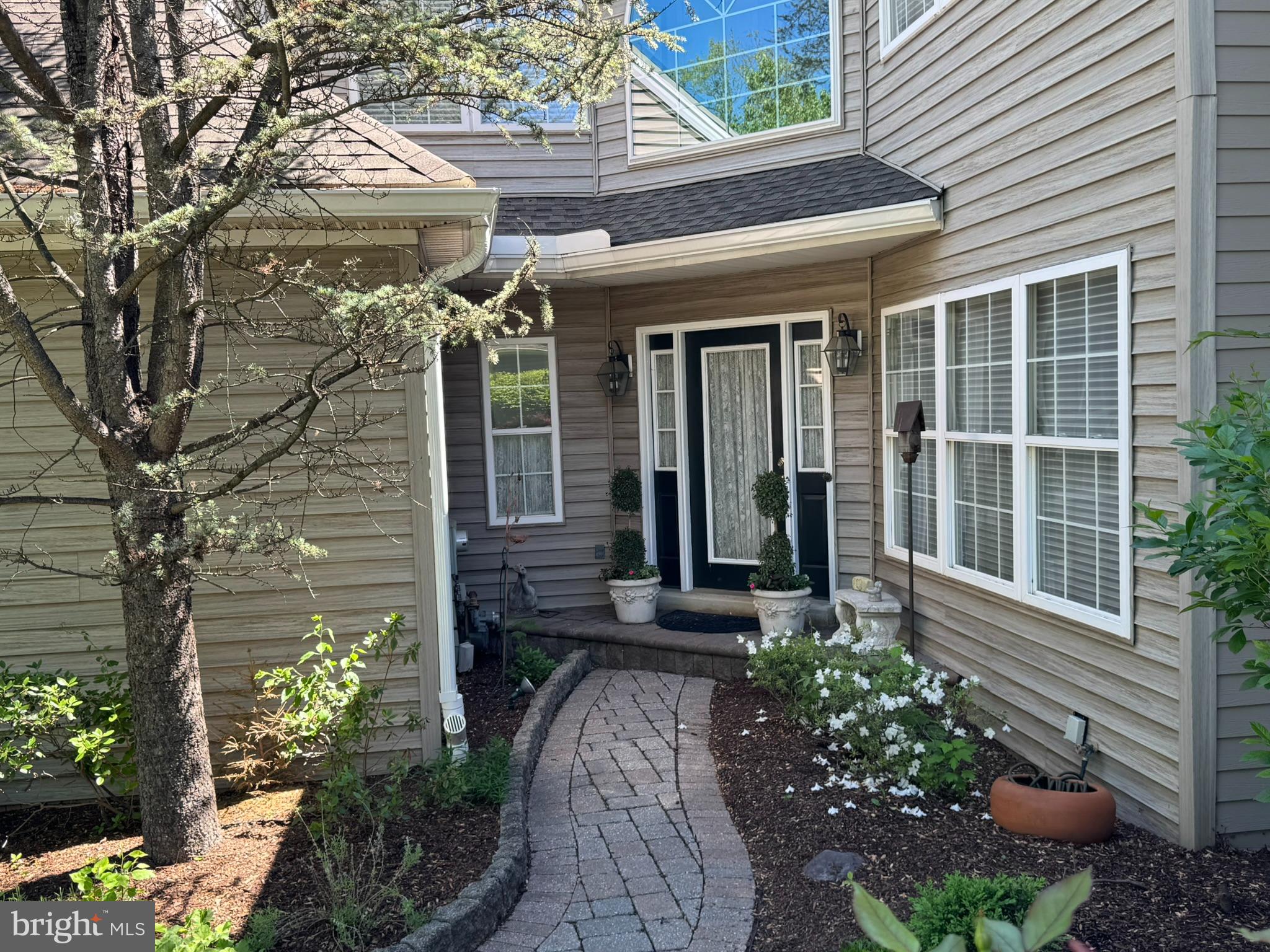 Come enjoy this immaculate home in sought after Fernliegh Community. The nature and surroundings are beautiful. Located just a 2-minute drive from Phoenixville Country Club, and within 10 minutes of downtown Phoenixville's vibrant shops and restaurants, Valley Forge Park, King of Prussia Mall, and major routes including Rt 422, I-76, and the Pennsylvania Turnpike, this home provides easy access to numerous amenities
Walk up through flowering court yard garden to private main entrance. Enter into Black and White Tile Foyer area, Powder Room off Foyer. Enter into Sophisticated Dinning Room, then to Newly remodeled Kitchen with Eat in Section/Family Area. Look out the Kitchen French doors to open space with an abundance of nature. The Living Room is a great relaxing cozy area with gas fireplace and great natural light. The views and nature off the rear deck provide tranquility and peace.
All Appliances have been recently updated
Level Two has awesome open Foyer area with large arched window providing excellent natural light. Primary Master Bedroom with Master Bath and two large walk-in closets, 2 Additional Bedrooms with Hall Bath.
Phoenixville 3 miles away, King of Prussia 6 miles Paoli Train Station 4 miles.