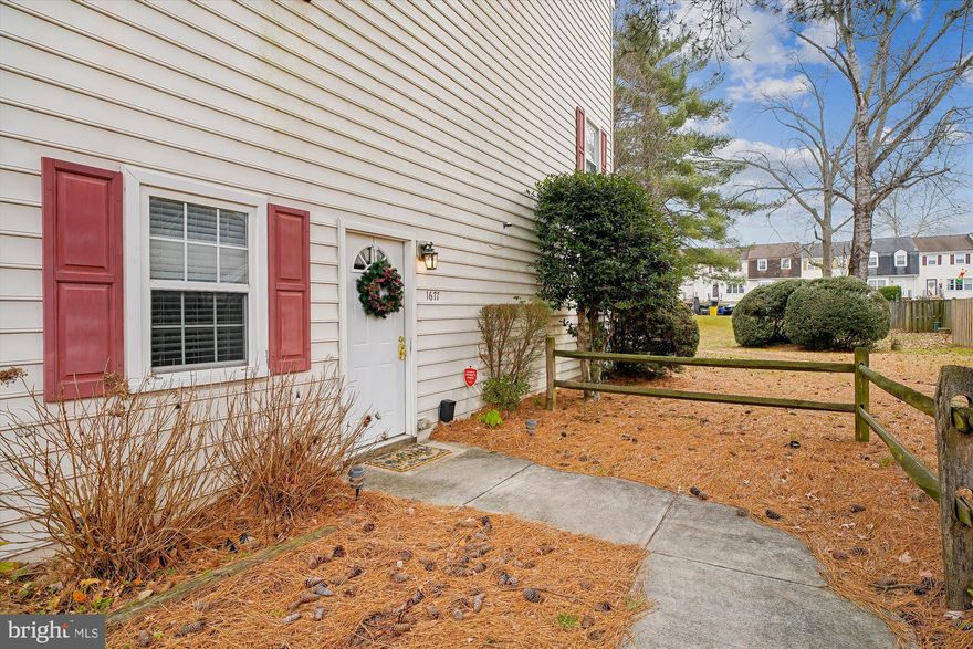 Open house Saturday 12/27 noon-2 pm Bright & Cheery Ground Level End Unit Condo Is Ready For You to Move In! Side Entrance Allows Tons of Natural Light in Home. Open Concept Living Room and Dining Room with Beautiful Flooring and Wood Burning Fireplace. Large eat-in updated Kitchen has Cute as Can Be Built-In Window Seat, Newer Stainless Steel Appliances, Granite Counters & Pantry. Large Master Bedroom has Double Closet. Updated Bathroom with Granite Sink and Private Laundry Room. Storage Is Never An Issue With So Many Closets & Additional Outdoor Storage Room. Sliders in Living Room Walk Out to Fully Fenced, Private Courtyard Which Leads to Neighborhood Park. Community Features Include Tot Lots, Plenty of Parking, Schools and Nearby Library. Additional features include in-unit  stackable front loading  washer/dryer (2020), two generously sized bedrooms with ample closet space, and reserved parking located directly in front of the unit.  Energy efficient Heat pump 2018,& hot water heater 2019. Located in the Crofton High School district and just minutes from Waugh Chapel Towne Centre, grocery stores,  restaurants, parks, and major commuter routes to DC, Baltimore, and Annapolis, this home offers a low-maintenance lifestyle in a prime location.