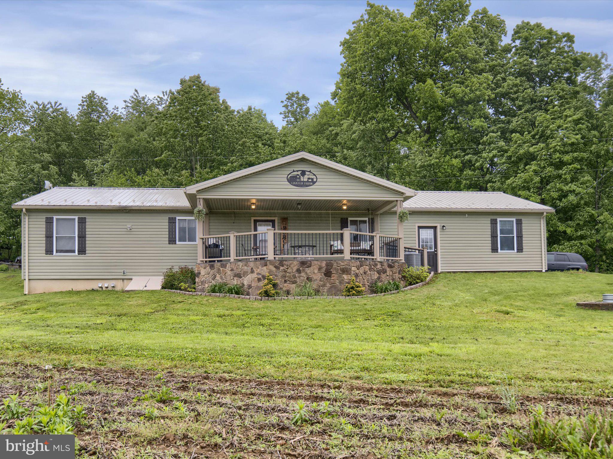 Call today to see this like new 1440 square foot 3 bedroom 3 bath home with an oversized 2 car attached garage and a 40X6 detached garage/workshop on 1.69 rural acres in Penns Valley School District! The main floor consists of a laundry/mud room, open concept kitchen, dining and living room opening in the front to an expansive 22X24 covered front porch and in the rear to a 12X24 covered rear porch, a master suite with full bath, two additional bedrooms and another full bath. Stainless steel refrigerator, range and dishwasher are included. The full finished basement is accessible inside from the laundry/mud room and from the exterior via the steps to the bilco doors and consists of a large entertainment area, a kitchenette/bar area, a sizable storage closet, a full bath with shower, and a utility area. 200 Amp electric service, propane on demand hot water furnace provides domestic hot water and radiant heat, water softener and filter, Kohler generator, manabloc water system, and central air. Private well and septic. All of this plus an attached 30X24 Garage providing lots of additional space for a workshop, storage, or for all of your additional toys. And ... there is also a 40X60 detached garage/workshop for whatever your wants or needs. All of this on 1.69 mostly level rural acres with reasonable access to the State College/Bellefonte area for medical access, shopping, dining, entertainment and all that it has to offer. For rural fun you are also close the Bald Eagle State Forest, Poe Valley/Poe Paddy State Parks, Penns Cave, and the Grange Fair.
In addition to all this, if you have kids in school, you will no longer need to drive the older ones to school or pick them up from school, practices, or games because it is all within a half mile walking distance!
Shown by appointment only.