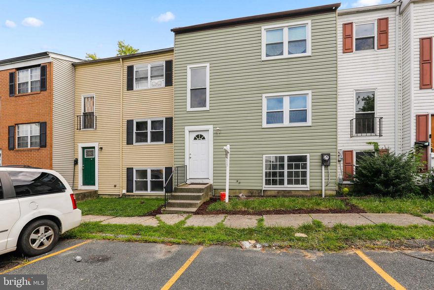 NEWLY RENOVATED TOWNHOUSE W/ 3 FINISHED LEVELS BACKING TO COMMUNITY GREEN SPACE - this new renovation features an open floor plan with engineered hardwood floors throughout, crown molding, coffered ceilings, wainscoting wall detail, new custom cabinetry in kitchen w/ butcher block countertop, tile backsplash, ss appliances, large living room and 3 bedrooms on upper level with renovated full bathroom.  Fully finished walk out lower level offers 4th bedroom, finished club room, full bathroom and fenced rear yard.  One car assigned parking and ample guest parking.