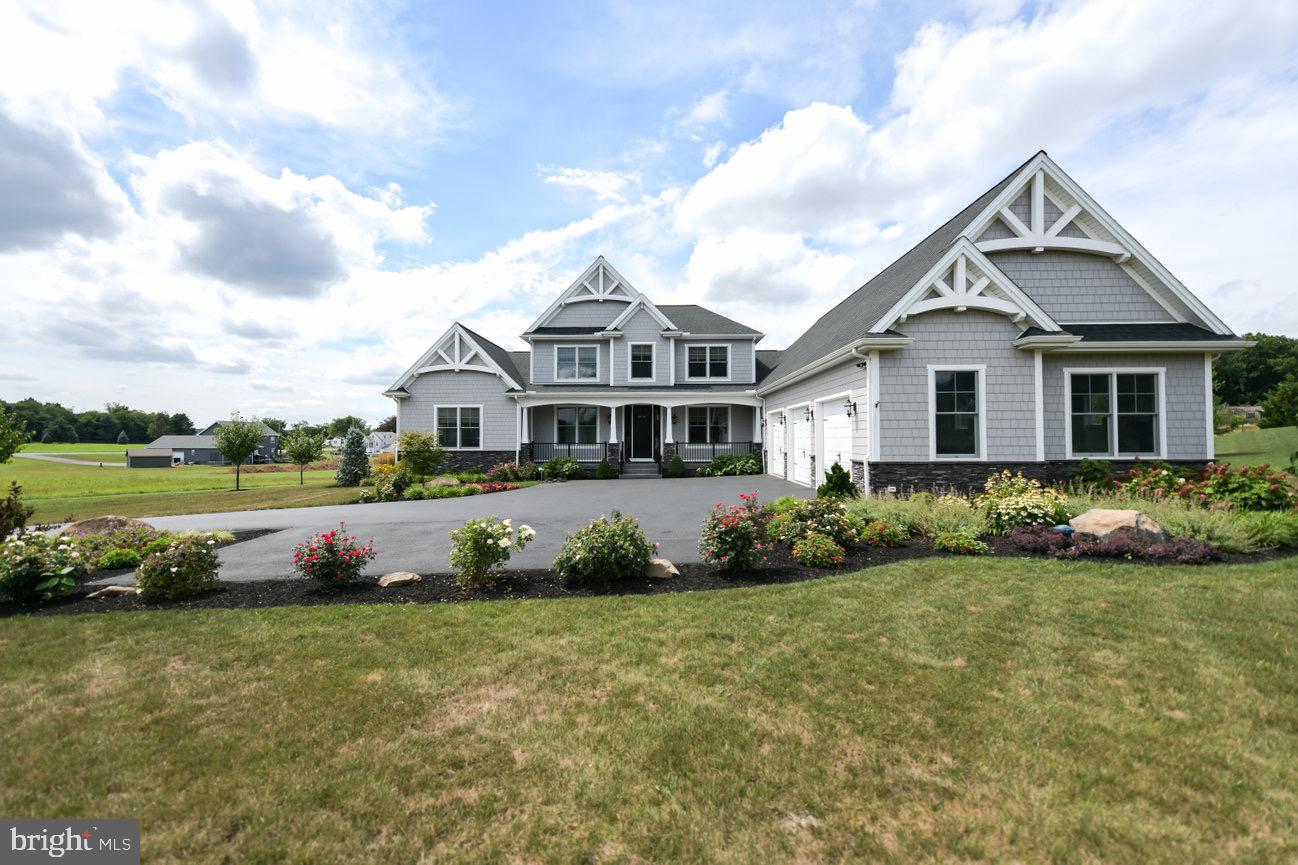 Custom Build Roland Home located on 2.5 acres in Hershey! This stunning home was built in 2022. With James Hardie Siding and Craftsman Trim, this home shows like a model and has upgrades throughout. Entertain family and friends in the spacious kitchen which boasts a large quartz island with seating for 5- ideal for quick meals and food preparation. The sizable walk-in pantry is and has built- in shelves- ideal for storage. The double oven and gas cooktop will please the chef in the family. Quartz countertops, inset cabinets and beverage refrigerator help to make the space functional and beautiful. The open plan flows into the family room with custom built-in shelves and reclaimed wood beams-an ideal spot where you can watch the big game. The stone fireplace is two sided so you can enjoy it inside or out- S'mores anyone? The well-appointed dining room is surrounded by windows and has a vaulted ceiling creating an awesome space for meals or a bright spot to complete homework. Working remotely? the first level office with double glass doors will be ideal! Retire to the first level primary bedroom which has two walk-in closets-ideal for any shopper, and an ensuite with a walk-in tile shower, a soaking tub, a heated towel rack and dual sinks. Laundry won't be a chore in the bright and spacious laundry room with upgraded tile floors. A half bath and a mud room round out this level. The second level has three good size bedrooms and gorgeous full bathroom with upgraded countertops and floors. No need to scrape ice or snow from your vehicle with the attached three car garage. The unfinished lower level is a blank k slate. With over 2,000 SqFt, use it as an exercise area, a workshop space or store seasonal items and holiday decor. Enjoy efficient gas heat and 2 tankless water heaters. If you like outdoor living, the screened-in back porch , which overlooks the professionally landscaped backyard, will be the place for you! Host a bar-b-cue and enjoy dinner outside on the back patio. Create a garden or play a game of catch in the spacious backyard. Located approximately 5 miles to Hershey Medical Center this spectacular home is a must see!