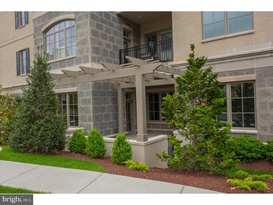 Have you been looking for the excitement of center city living without having to leave the suburbs? Look no further! 100 St. Georges Road in Ardmore masterfully blends the excitement of city living with the leisurely pace of a close-knit neighborhood. Its classic architectural features and contemporary design are perfectly placed in the heart of the Main Line, steps away from sensational Suburban Square with its eclectic mix of sought after retailers, restaurants and services. You'll be a short walk to the regional AMTRAK and SEPTA rail that provide direct service into Philadelphia and New York several times a day.  This is your chance to buy in this highly sought after building. As you enter the unit you'll; be greeted by a beautiful foyer with a large coat closet. This opens up into an lofty great room with 9-10 foot ceilings, a fireplace, built-ins and beautiful hardwood floors throughout. The dining room area offers room for lots of entertaining. The spacious family-friendly kitchen features a substantial island which can seat four. One can also find beautiful Bosch and SubZero appliances. The sun filled master suite with a large walk in closet showcases a master bathroom with marble and ceramic tile finishes. This unit has 2 additional bedrooms, 2 full baths and an abundance of closet space. In addition, there is a laundry/utility room.  Custom interior millwork, Pella windows, high efficiency heating and air conditioning systems plus a sprinkler and security system are all included. When you want to escape outdoors, you can head outside to your covered terrace with a large pergola patio. Two parking spaces and a large storage unit are also deeded to this home in the underground parking garage. Don't miss out on this special opportunity to call 100 St Georges Road your new home.