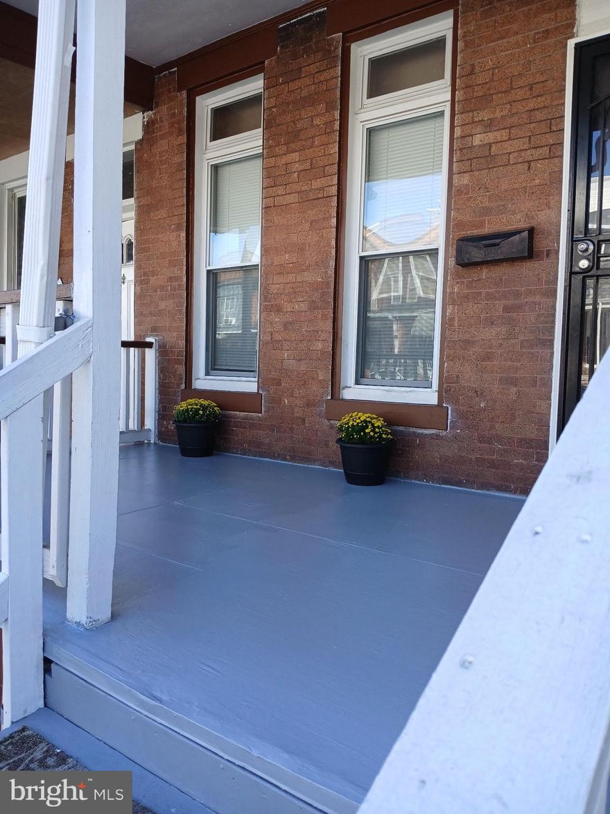 Welcome to your beautifully remodeled Baltimore home, just two and a half miles from Hopkins University Hospital. This spacious 2,700-square-foot property offers three levels of living space with four bedrooms, two full baths, and gleaming hardwood floors throughout. You'll enjoy a full walk-out basement complete with its own full bathroom, and all the major systems—HVAC, water heater, and AC—are less than five years old. Plus, there's convenient alley parking in the back. It's truly ready to welcome you home!
Setrilock of the iron rail on the right of the front door. As is.
