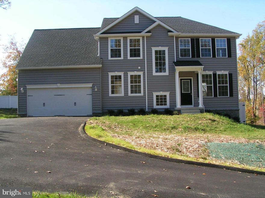 Spec House is Ready & Priced to Sale! 50K in extra options!10K total closing pd. Kitchen has granite counter tops & maple cabinets, stainless steel appliances,  9 ft ceilings,  main level wood floors in liv. rm, great rm. & kitchen. 2 ft ext. on 2nd floor. Sliding doors lead to a 12x20 concrete patio.Paved Driveway and Landscaping. Visit  HBI Model,Cove Pt. Rd., Lusby, MD. Open Thurs-Sun 11- 5 PM.