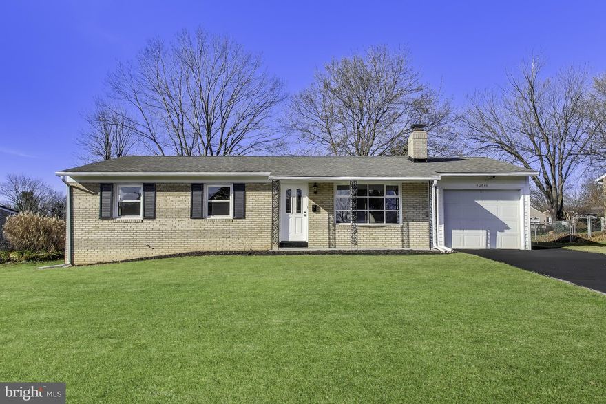 Welcome to this beautifully renovated home, where modern updates meet comfort and style. Nestled in a quiet, established neighborhood, this home features a bright and inviting main level with a warm living room, fireplace, and beautiful hardwood floors that create an elegant yet cozy atmosphere. 
The home offers three generously sized bedrooms and a brand-new full bathroom with a clean, modern finish. At the heart of the home, the fully renovated kitchen includes new 42" cabinets, granite countertops, and stainless steel appliances. Luxury vinyl flooring adds durability and style, and the kitchen provides convenient access to the one-car garage and backyard.
The spacious basement expands the living space with a large recreation room ideal for gatherings, movie nights, or entertaining guests. It also features new luxury vinyl flooring, a full bathroom, and a dedicated laundry room with a new washer and dryer.
The home has been freshly painted throughout and includes recessed lighting, new moldings, and new interior doors. Recent updates also include a new HVAC system and water heater, adding to the move-in-ready convenience.
Step outside to a level, fenced-in backyard, perfect for outdoor entertaining, relaxing, or providing a safe space for children and pets.
Additional features include a driveway and one-car garage with space for up to four vehicles combined.
Conveniently located near major shopping centers, including the Premium Outlets, and commuter routes such as I-70, I-81, and other major travel routes, this home offers both tranquility and accessibility.