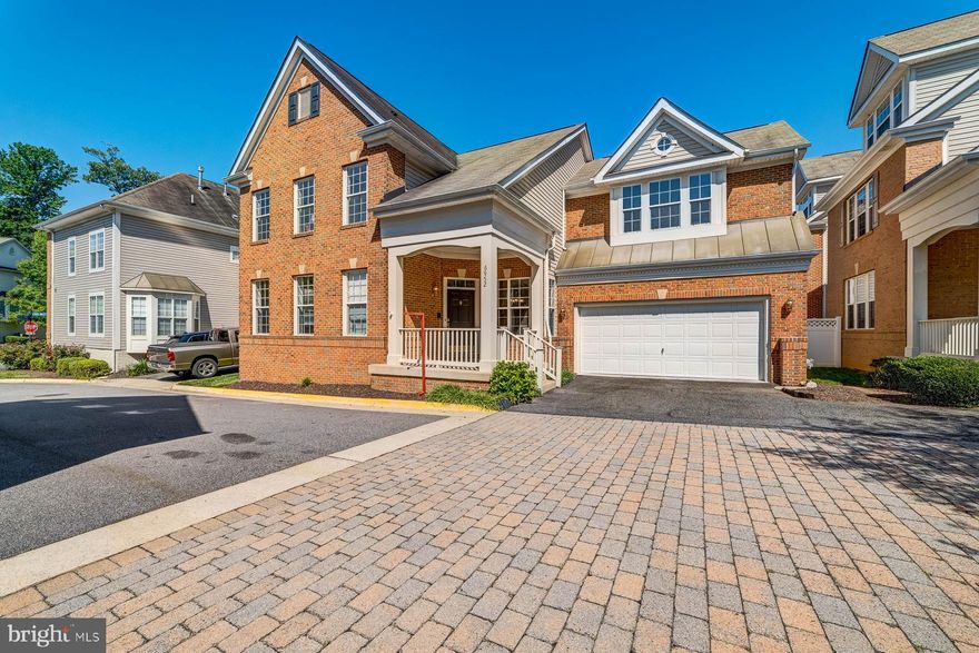 Beautiful 3 level colonial with two car garage in Inlet Cove! From the front covered porch, enter to the main level where you will find a family room with gas fireplace, half bath, dining room, and open floor plan kitchen. The kitchen features granite countertops, island, newer stainless steel appliances, gas cooking, and access to the backyard. A lovely brick patio and fenced yard await your morning coffee break. Upstairs features 3 large bedrooms, an accompanying full bath and laundry room. The spacious primary suite includes an updated bathroom (2020) with soaking tub, walk-in shower, and dual sink vanity. On the lower level, enjoy a fully finished basement with 1 large bonus room and 1 full bedroom featuring custom built ins, a recreation room with gas fireplace, and unfinished storage area.  HVAC: 2017. The Inlet Cove community offers its residents great amenities such as a pool, sport courts, playgrounds, and walking paths. Commuting from here is easy with access to Rte. 1, Fairfax Co. Pkwy. and I-95. 0.5 mile to VRE bus stop at Telegraph Rd. & Lockport Pl. 2 miles to Lorton VRE Station. Only 2 miles from Fort Belvoir. 2.7 miles to Wegmans. 2.1 miles to Pohick Bay Regional Park. 4 miles to Lorton Workhouse Arts Center. 6 miles from Franconia-Springfield Metro/ Blue Line. Don’t miss this amazing opportunity to call this lovely home your own!