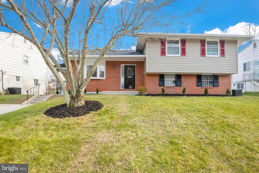 Price improved on this exceptional Home.  Gorgeous 4 bedroom 3 bath split level in sought after neighborhood.
Open concept with mostly hardwood flooring through out. 
Your dream kitchen awaits, with gas range, large family sized  fridge, and ,expansive Island with sink. The light is fantastic from large front window, and side door, that allows car to door access, with covered landing. Loving the way  the island contains your sink and dishwasher with room for 2 stools . And did you notice how the light fixture matches the beautiful  back splash?
Open concept, blank slate, waiting for your personal inspiration and vision.

Lastly on the main floor is a separately heated sunroom  for those cold but sunny days. Access the back yard and expansive patio.

Large master and 2 other bedrooms up stairs with hall bath. Great spaces with 2 linen closets and original hardwoods.
In lower level a fourth bedroom complete with large closet , fireplace and bath. Allowing for a second master complete with fireplace and  slider to the covered patio. What a great space. Easily the best space with the most versatile uses. Don't need a fourth bedroom use as den, guest room, game room. Separate entrance from gate makes this truly private.

The yard includes large  shed, beautiful vinyl   fence. And in the spring lush green yard.
Under house is additional space used by previous owner as added storage area.
Comes with American Home Shield  Home Warranty