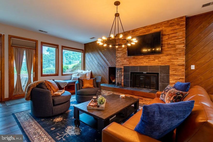 REMODELED AND REFURNISHED GROUND LEVEL SLOPE SIDE CONDO LOCATED ON DIAMOND HILL SKI SLOPE (SLEEPS 6). REMODELED/REFURNISHED IN 2021 FEATURING; TOP OF THE LINE LVP FLOORING, NEW CABINETS, QUARTZ COUNTERTOPS, NEW REFRIGERATOR AND DISHWASHER, DEEP KITCHEN SINK, TILED BACKSPLASH, FLOATING SHELVES IN KITCHEN, NEW WASHER/DRYER, NEW HVAC, NEW HOT WATER HEATER, TILED HEARTH WITH WOOD BURNING FIREPLACE, REFINISHED/STAINED WOOD WALL, READING NOOK/BED BY WINDOW, LEATHER SLEEPER/SOFA, 2 ROTATING LEATHER CHAIRS, QUEEN BED WITH ROLL OUT TWIN TRUNDLE BED UNDERNEATH, AND OUTDOOR FURNITURE ON BACK PATIO. LOCATED JUST STEPS AWAY FROM DIAMOND HILL SKI SLOPE.