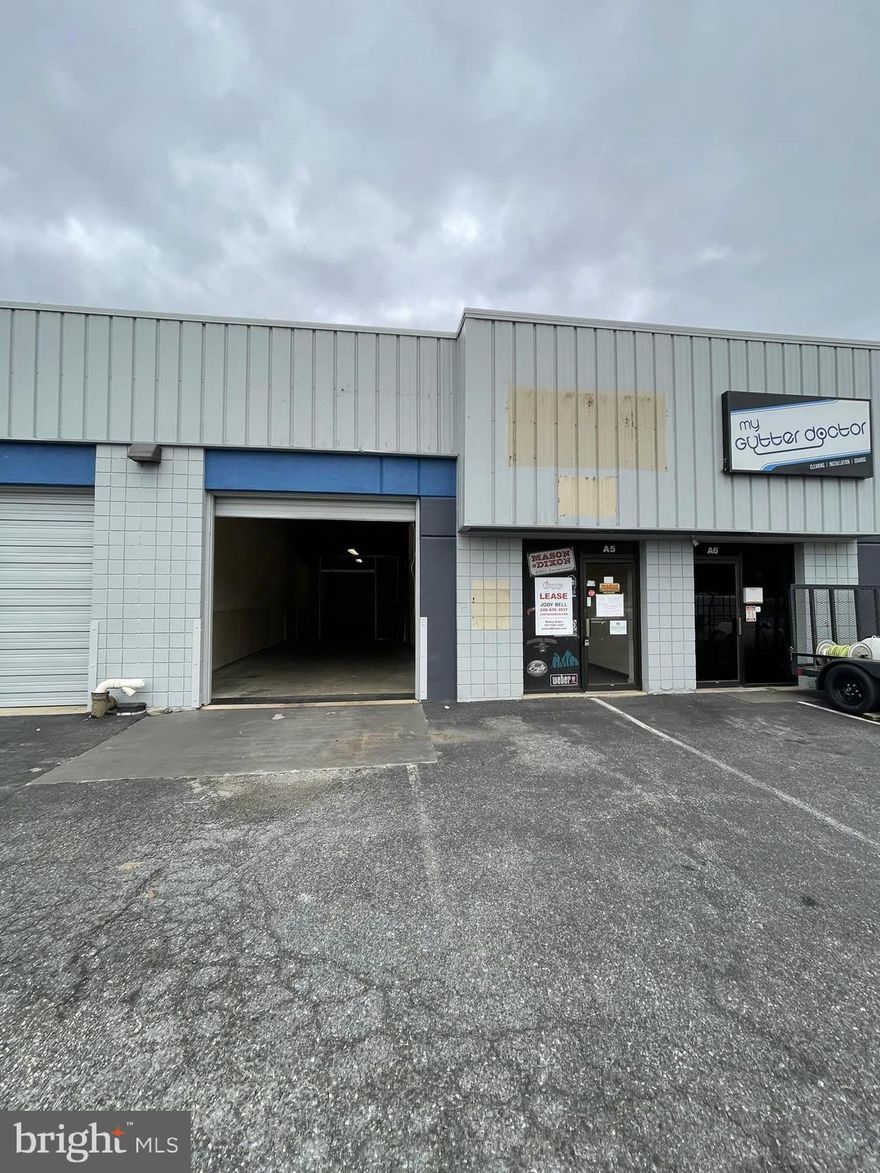 Suite A-5 is a 2,080 SF Warehouse Space with Drive-In Door, Office, Warehouse Area, and a Restroom.
Conveniently Located Near I-70 Exit and Adjacent to East Patrick Street and Monocacy Blvd. 
Buildings are concrete block & metal construction. Warehouse Ceiling Height is 14. Free Surface Parking with Security Lighting. Zoning is M1.