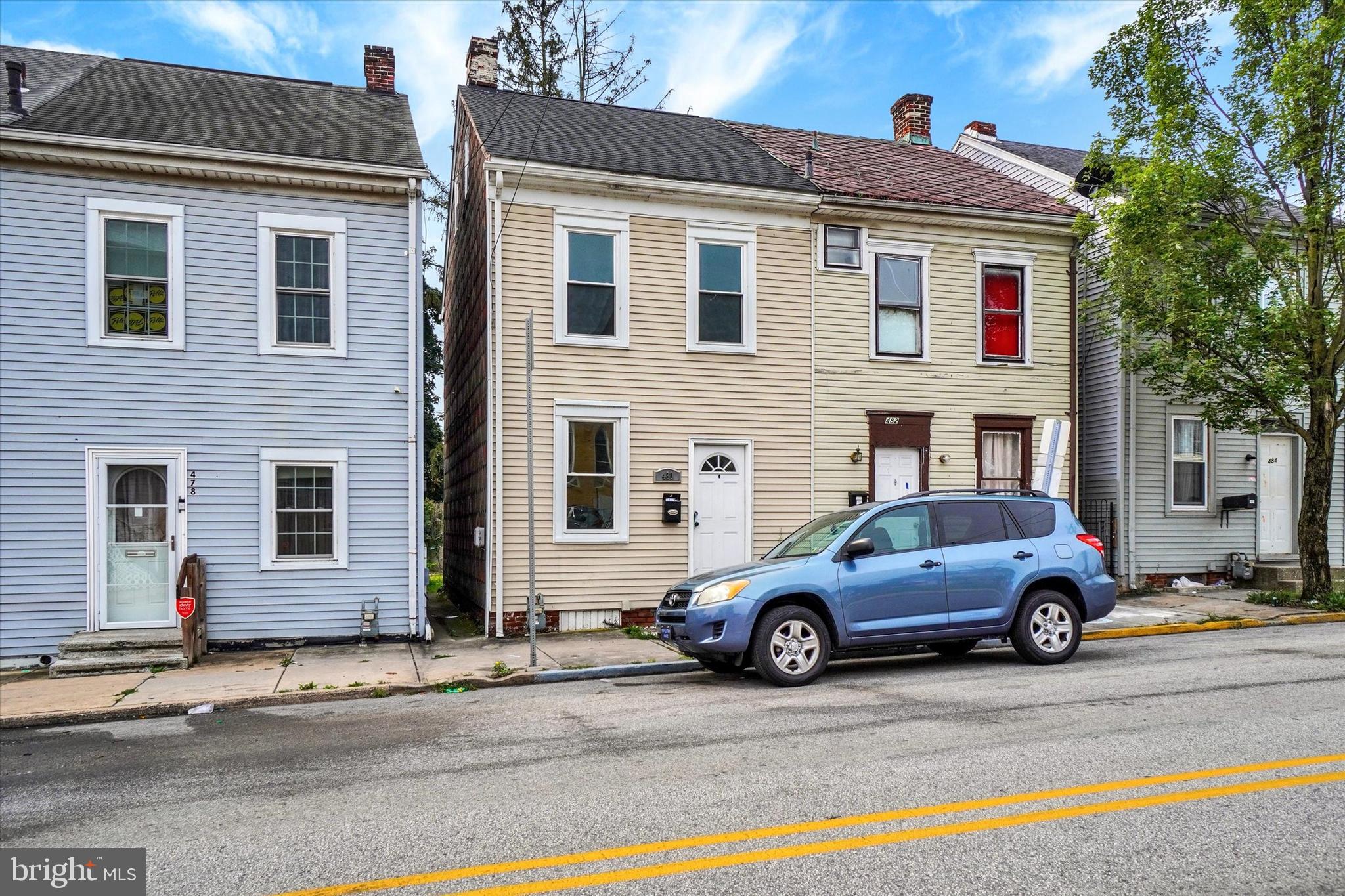 Move right in or add this home to your portfolio. This home was renovated just 6 years ago. There are replacement windows. The washer and dryer hook-ups are very conveniently located in the kitchen. Add some threshold covers to the bedrooms and the carpeting shows like new. Off street parking is included!