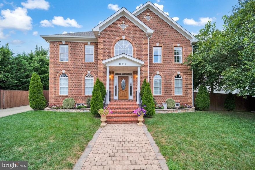 *Huge Price Reduction - Motivated Seller*
Discover an exquisite custom brick home estate with 6294 finished square feet, featuring 7 bedrooms and 6 full baths. Upon entering through the front door, you'll be greeted by a luxurious two-story foyer. The main level boasts coffered and tray ceilings, it also presents stunning ceramic tiling w/ granite medallions. It is also complemented by custom wood trim moldings and a main level bedroom suite w/ hardwood floors. The open floor plan fills the home with natural light, perfect for entertaining! The kitchen is a chef's dream w/ stainless steel appliances, large  walk in pantry, and kitchen island. Never run out of storage w/ this kitchen's ample cabinetry. The kitchen opens up with seamless flow to multiple rooms including the family, living, and dining room. Plenty of parking with the three car garage and circular driveway. The garage also features a separate entrance leading to the guest house. Step outside to the privately fenced and expansive hardscape terrace w/ a wood-burning fireplace. The property has beautiful landscaping and an irrigation system maintains the lush lawn. Inside the primary suite features a wet bar/coffee station and a spa bathroom complete w/ free standing tub and stand in rain shower. The convenience of two laundry rooms, one on the upper level and one on the main level, adds to the ease of living. In the lower level  you will find a large recreation room w/ a full bathroom and flex space to transform into an office space to work from home and/or an fitness area. There is also a theater area w/ a wet bar. This home is conveniently located just minutes from the Vienna Metro, this estate provides easy access to a variety of amenities, including restaurants, parks, shops, and the vibrant downtown area of Vienna. Don't miss the opportunity to experience this exceptional property firsthand. And best of all, there is no homeowners association (HOA) governing this magnificent estate, providing you with added freedom and flexibility.