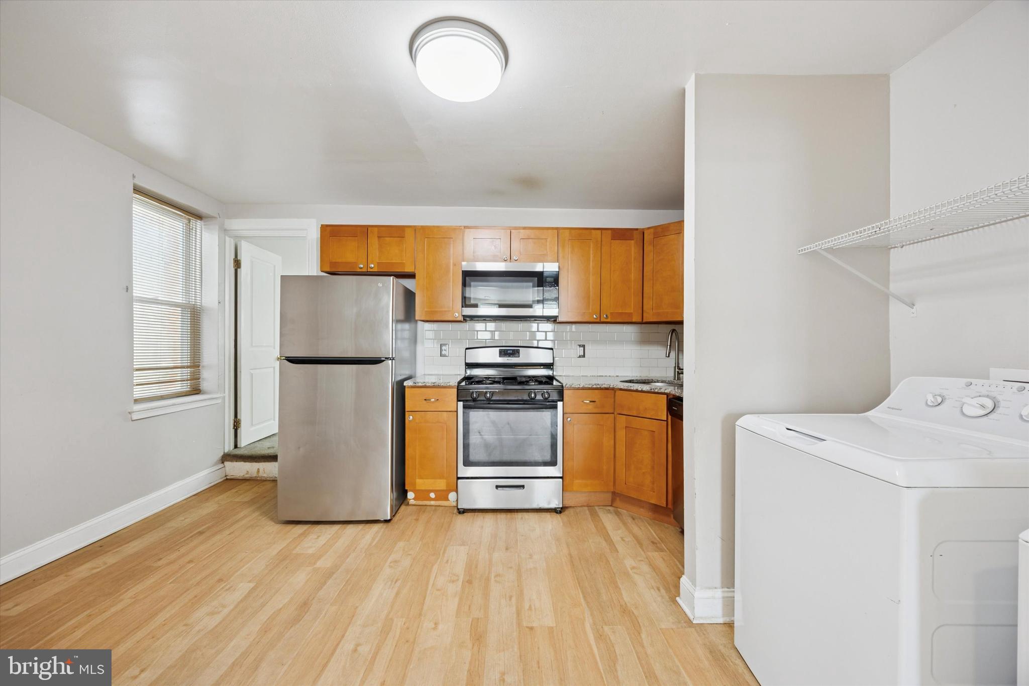 Step inside this spacious 2-story townhome. This 4-bedroom, 1-bath home is being sold AS-IS. Walk through the front door and into the main living space. Hardwood floors guide you towards the back of the home and into the kitchen, complete with stainless steel appliances, granite countertops, and a washer and dryer. From there, head out back to your own private yard, complete with wood fencing. With a bit of imagination and a green thumb, the space can easily become an oasis away from the hustle and bustle of the city.
Head up the carpeted stairs to the four bedrooms and one full bath. Each bedroom is flooded in natural light and has a closet. The bathroom features a shower/bath, as well as open shelving.
Downstairs, a full, unfinished basement is perfect for storage.
Located in the Mill Creek neighborhood off of Lancaster Ave., future owners will enjoy being in close proximity to the Philadelphia Zoo, Please Touch Museum, parks, markets, restaurants, and more.
Schedule your tour today! Property is being sold in AS-IS CONDITION.