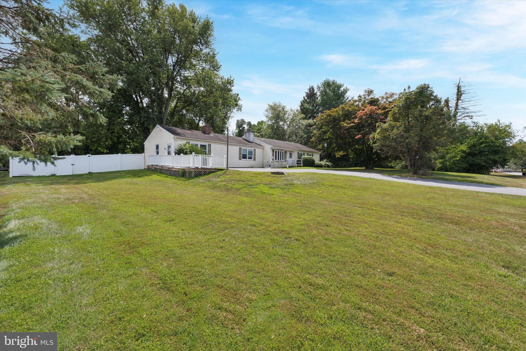 Welcome to this sprawling 4 bedroom, 3 full bathroom ranch home in desirable Downingtown School District! Situated on an oversized lot, this home offers a private, fully fenced backyard with mature shade trees and plenty of flat, usable yard space! Inside you will find more than enough space, with a flexible floor plan that can be used in various ways to accommodate your family’s lifestyle. Enter to find a large living room, complete with hardwood floors, brick fireplace, and recessed lighting. The kitchen features plenty of oak cabinetry, stainless refrigerator & range, and more recessed lighting. The hardwood floors continue throughout most of the home, including the 4 spacious bedrooms! Getting ready in the morning will be a breeze, as there are 3 full bathrooms…perfect to accommodate a large family or multi-generational living. Convenient one-level living, with handicap accessible features and ADA compliance. This home is clean and neutral, the ideal backdrop for your personal decorating style. The driveway offers convenient parking for 4+ cars. Step outside to enjoy the serene backyard, complete with full privacy fencing. This will be everyone’s favorite place to gather for a bonfire in the upcoming crisp Autumn nights. Schedule a private tour today; you won’t be disappointed by all the space this home has to offer!