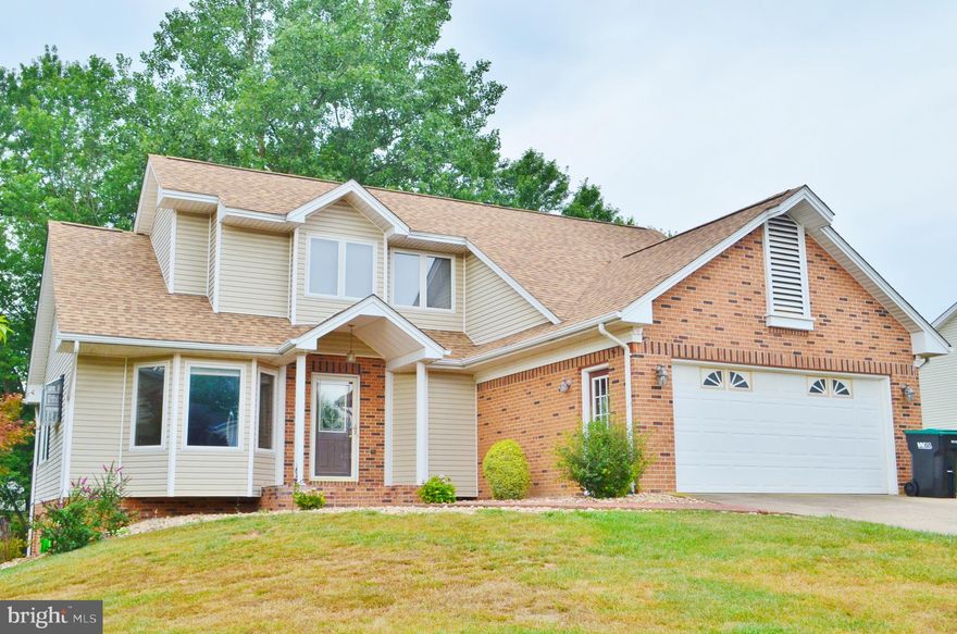 Highly Sought After Home in The Foothills subdivision. Beautiful Contemporary Architectural Construction with Open Floor Plan featuring Vaulted ceilings in the Living/Dining, and Master Bedroom on the Main Floor. Oversized Two-Car Garage, Separate Laundry Room with Wash Sink and Cabinetry, and Half Bath all Easily Accessible From Main Level Hall. Kitchen boasts a Breakfast Dining Bar, Stainless Appliances, Quality Dark Granite Countertop with under mount Sink and Stainless Faucet. Entertain Guests on the Back Deck or Patio Underneath! Upstairs includes additional Two Bedrooms and Full Bath, while the Lower Level Features a HUGE finished Family/Entertainment Room, 4th Bedroom with Spacious Walk-In Closet, and 3rd Full Bath. Utility Room with Additional Refrigerator, Water Softener System, and Natural Gas Forced Air! Large Shed and Backyard. This Home is located conveniently on the edge of town near the Golf Course, at the near end of a quiet Cul-De-Sac. Great Location with Mountain Views!! Call Skyline Team Today for a Personal Tour!