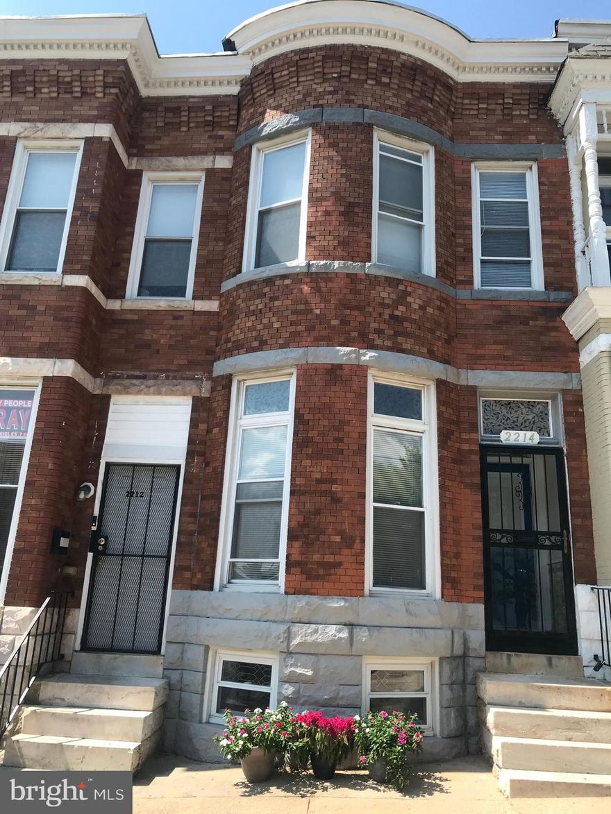 JUST REDUCED and priced to sell  this property is ready to be yours! Bring your best offers for this motivated seller. Calling all buyers, investors and landlords this updated property is ready to be your new home or added to your rental portfolio! Property is being sold AS IS.

New appliances include a gas stove/oven range, built-in microwave, improved refrigerator, washer, dryer and brand-new central air conditioning. The kitchen includes new granite countertops, updated cabinets and backsplash leads to the beautiful backyard. The updated and restored deck in the backyard opens up to your own shaded parking pad, unique for the neighborhood and fully-enclosed with a brand new fence. The fully-finished basement is ready to be your own entertainment area, deluxe storage or potential bonus room! Gleaming hardwood floors lead to incredibly spacious, airy bedrooms with plenty of natural light. Both bathrooms are re-tiled and revamped for the new owner. Enjoy all the convenience of living minutes away from I-83, downtown, Penn-North Subway Station and walking distance to the beautiful Maryland zoo and surrounding Druid Hill  Park.