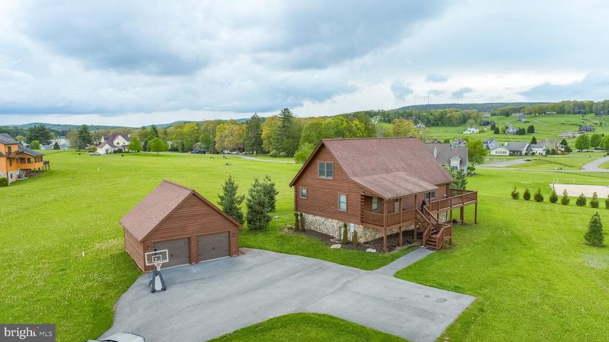 Welcome to this stunning 5-bedroom, 3.5-bath log home nestled in the Misty Meadows section of the Waterfront Greens community. Perfectly blending rustic charm with modern comfort, this home features an open floor plan filled with an abundance of natural light, ideal for both everyday living and entertaining.
The main-level master suite offers privacy and convenience, while the expansive lower level boasts a large recreation room, perfect for game nights, movie marathons, or hosting guests. The warm wood finishes and thoughtful layout create a welcoming, lodge-style atmosphere throughout. Enjoy access to all of Waterfront Greens’ premier amenities, including a private 9-hole golf course, tennis courts, fishing pond, lake access, and scenic walking trails. Whether you’re looking for a year-round residence, a weekend getaway, or an investment property, this home offers the lifestyle you’ve been searching for. Don’t miss your opportunity—schedule your private tour today!