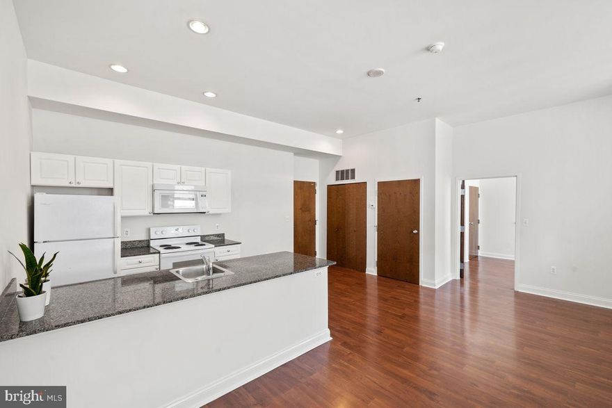 Terrific rental at the historic, Victory Building. Built in 1873 by Henry Fernbach, in the Second Empire style, as Philadelphia's first commercial building. The Victory Building was restored and turned into condos in 2003. This particular unit has a layout with 2 one-bedroom suites on either side of an open kitchen/dining/living area. Walkability score of 98 and transit score of 100. Situated across the street from both Jefferson Hospital and Rothman, in the center of Philadelphia, with many fabulous restaurants, shops and entertainment venues close by. The building features an on-site concierge/doorman, a gym, convenient paid laundry across the hall, and a number of parking garage options within a block radius. Landlord will consider a small dog (s) with deposit and only if the dog (s) conform to building rules. No cats sorry.