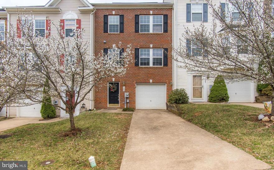 This 4 bedroom 3.5 bath townhome is ready for you! The long driveway provides plenty of off street parking and the one car garage keeps your car, and you, out of the weather. The main level features a spacious living room with carpet and convenient half bath. The large kitchen includes easy care laminate countertops. The large island and pantry provide lots of extra storage space. The kitchen opens into the dining area, great for entertaining. Glass doors lead onto your spacious deck with nice views. The upper level of the home features three nicely sized, carpeted bedrooms with plenty of closet space. The hall bath includes an extended single bowl vanity and tub/shower combo. The primary suite is carpeted with vaulted ceilings. Here you'll have a large walk-in closet and a private ensuite. The primary ensuite features a double bowl vanity for lots of storage, a walk-in shower, and a separate tub. You'll have all you need and more! The lower level of the home is fully finished. Here you have a spacious 4th bedroom with rear yard access.  The lower level is fully equipped with a full bath with single bowl vanity and tub/shower combo. Outside you have a nice, level rear yard with fences on either side. This home has everything you want and more! Call for your showing today!