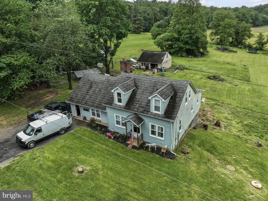 4 bedrooms with 2 on main level and 2 full baths on 3 acres!  These gems just can't be found in this market.  The sunsets behind this house and block outbuilding are to die for.  The home was renovated about 10 years ago with a long-lasting metal roof, water heater, and so much more.  A walk-out basement is also a nice feature to highlight.  Professional photos will be completed and uploaded soon so be sure to save this listing and check back frequently.