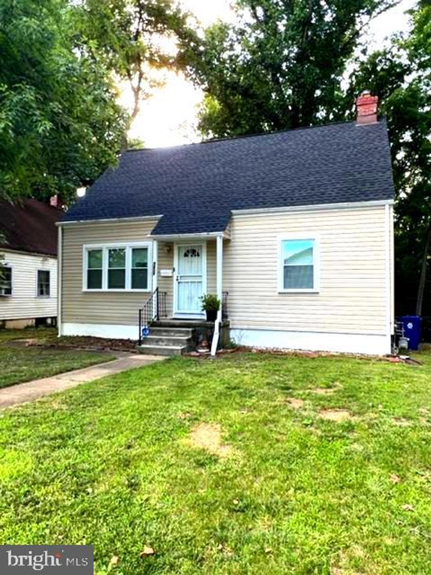 This fully renovated beautiful home has wonderful features and upgrades. It boast beautiful hardwood floor throughout the entire main level,  modern tile and backsplash in the kitchen with all new kitchen appliances, brand new ceiling fans throughout the home. 3 bedrooms (one a master suite) and 2 full bathrooms. The main bathroom has a huge jetted bathtub. There is a  finished basement with room for the owners imagination on how to use it. The back yard is wooded with mature trees that offer wonderful shade in the summer. No street parking you have your own driveway. This beautiful home is tucked away in a quiet community with easy access to bus lines and major highways and streets. New Hot Water Heater, New Electrical Panel and Wiring ,New A\C unit, New Energy Efficient Windows, New Carpet, New Paint throughout! So many NEW features!***  House is ready to move in.  Hurry!