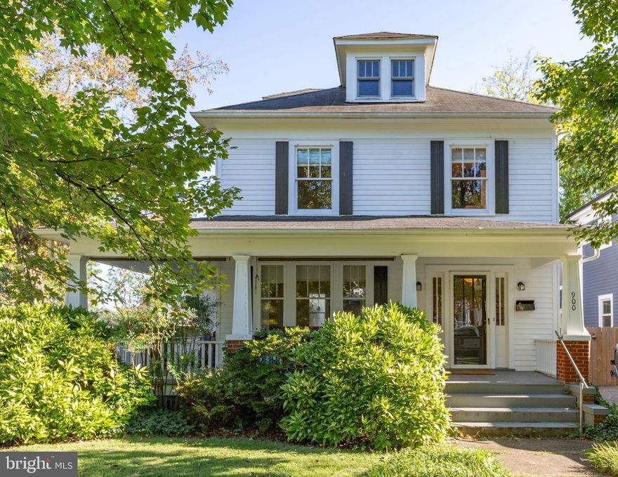 Remarkable 1939 Downtown city home w/approx. 2,759 finished SF on a corner lot. Exterior boasts a fenced rear yard,  inviting wrap porch, private patio, and mature landscaping. 
An existing curb cut off of Littlepage Street would allow for off street parking in the back of the house.  There is a shed that used to be an old style one car garage that could be converted back. 
A 2006 Main level addition includes a Primary Bedroom with a fireplace, a  full bath,  and a laundry room/pantry that flows smoothly into original portion of home.  The Kitchen and Main level full bath were renovated in 2015. Original wood floors on the main floor including the living room, dining room and large foyer. Lots of great built-in throughout the main floor as well. A very cozy sitting room just off of the dining room that exits out on to the wrap around porch.  The upper levels include 3 additional bedrooms, all with original wood floors,  a full bathroom and a finished attic loft area perfect for a home office/den or play room. Heading down to the basement adds an additional full bathroom and a large rec room area and plenty of storage.