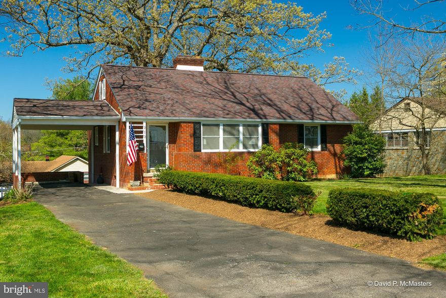 DON'T SETTLE FOR A TOWN HOUSE WHEN YOU CAN HAVE AN AMAZING SINGLE FAMILY. Amazing opportunity.  Awesome commuter location.  Fresh all brick rancher.  Fenced in back yard backs to quiet in town street allowing you to walk to Jefferson Memorial Park and pool as well as down town Charles Town! Quartz counter tops, new stainless steel appliances. Refinished hardwood floors. New LVP flooring in fully finished walk out basement.  Roof was recently replaced.  Nice attached carport and covered rear concrete porch!