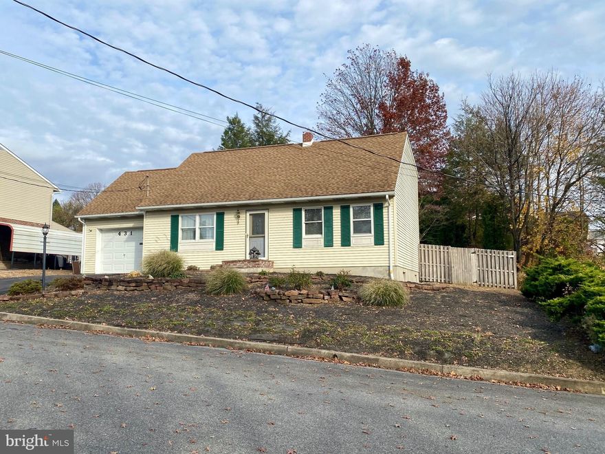 This home is larger than it looks from the exterior!   This spacious salt box has 4 bedrooms, 3 full baths, and a finished basement!  The first floor consists of a living room, light oak kitchen w/ dinette area, 2 bedrooms and a full bath.  The slider in the dinette leads to the rear deck.  The 2nd floor has a large master bedroom with a walk-in closet area, another bedroom,  and full bath.  The lower level consists of a family room with berber carpeting, another room that was used as a dark room for photography, full bath (shower stall only), and a utility room that has built-in shelving and laundry area.  There is laminate flooring leading from the front door to the dinette and kitchen area.  The kitchen has light oak cabinetry, 38 cabinets,  and snack bar area.  All the appliances will remain.    The rear yard is very private with some fencing and arborvitae trees.  Very low maintenance since the house has vinyl siding and the yard is finished in stones.  No mowing is needed!  Comfort of central air on those hot humid days is another plus! Within walking distance to middle school and high school.
