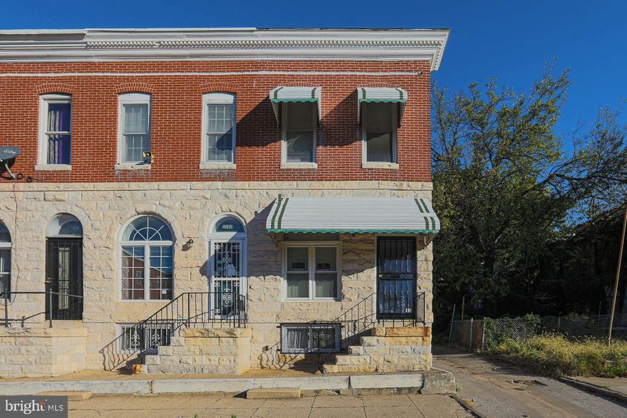 Large updated end of row  in fast growing Oliver/Baltimore East area. Close to Hopkins. This lovely home features updated flooring throughout, ceramic tile in the kitchen and bathrooms.  Enter into a roomy and inviting living room,  pass through a formal dining room and enter into an updated kitchen that features a walk-in pantry.  The 1/2 bath tops off this bright and cheery first floor! Head upstairs to 3 bedrooms and a full bath.  Two bedrooms are large enough to be primary bedrooms, both feature large closets and plenty of natural light! The basement is unfinished but ideal for storage and a laundry area.  Private backyard, perfect for entertaining.  Welcome home!