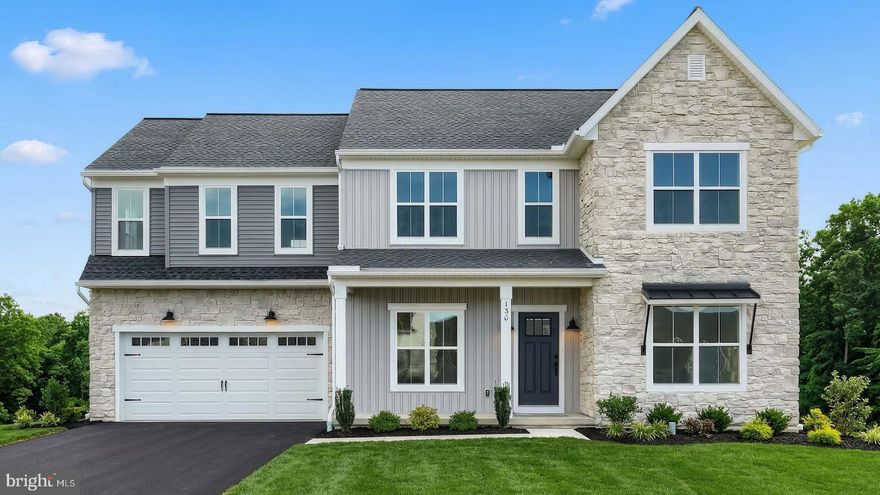 This beautiful home with a welcoming front porch includes a 2-car garage with a large mudroom entry and 9’ ceilings on the first floor. Stylish vinyl plank flooring flows throughout the main living areas. To the front of the home is a convenient flex room that can be used as a study, living room, or other versatile space. The kitchen is well-appointed with quartz countertops, a tile backsplash, stainless-steel appliances, and a large pantry. The sunny dining area provides access to a composite deck with a patio below, perfect for entertaining or creating your outdoor oasis. Open to the kitchen, the comfortable family room is warmed by a gas fireplace with a stone surround and box beam mantel. The 2nd floor owner’s suite features an expansive closet and private bathroom with a tile shower and double bowl vanity. Adjacent to the suite there are 3 additional bedrooms, a full bathroom, a spacious rec room, and a convenient laundry room. Images may include virtual furnishings for illustrative purposes only.