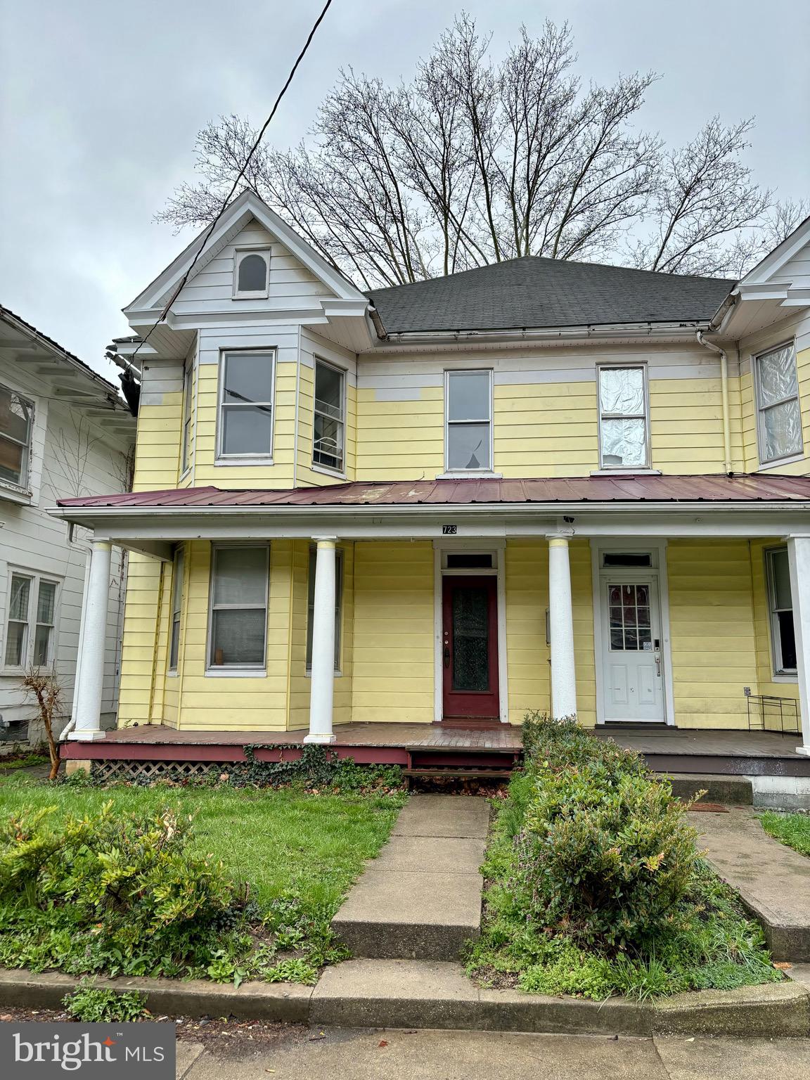 *Passed FHA appraisal, buyer couldn't get the loan closed, pending signed release* Very spacious, 4 bedroom 1.5 bathroom half duplex ready for you! This home comes with hardwood floors throughout most of the house. Main level offers an eat in kitchen and formal dining room with spacious living room, half bath and laundry room, and pantry. Upstairs gives 4 larger bedrooms and 1 full bathroom with a walkup attic great for storage. There is a charming covered front porch and a 2 car garage in the back with alley access! Check it out today. Agent is owner.