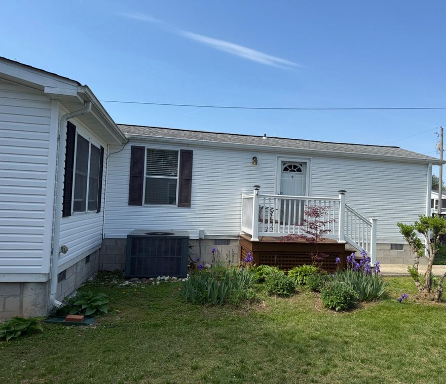 Wow! Just in time for summer fun! OWN THE LAND -NO LOT RENT on this well maintained 2 bedroom, 2 bath mobile home on a permanent foundation, (Class C). Enjoy this East of Rt 1 location which is close to shops, restaurants and beach. Relax in the 4 season sunroom or gather in the backyard with a beautiful field view. Plenty of off street parking for vehicles and a small boat. Easy to show. Schedule a visit today.