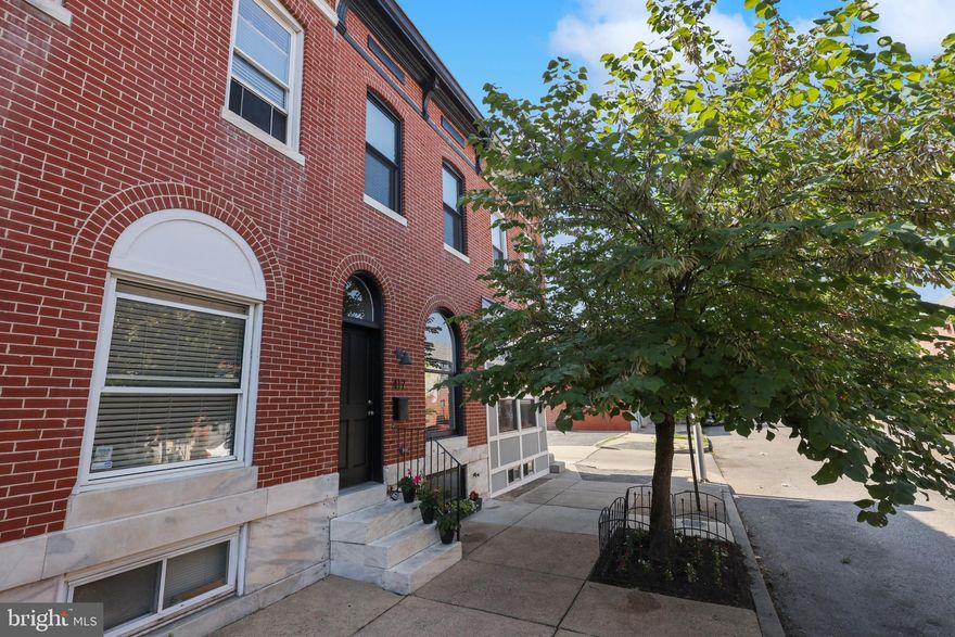 OFFER DEADLINE MONDAY 6/12 @ 3PM - PATTERSON PARK CHAP TAX CREDIT RENOVATION W/ 3 FINISHED LEVELS, OFF STREET PARKING & ROOF TOP DECK - this 14' wide renovation conveniently nestled between Canton and Patterson Park features over 2000 sq ft of living space with open floor plan offering hard woof floors throughout, exposed brick, crown molding coffered ceiling, large living room, separate dining area and stylish kitchen with ss appliances, marble tile backsplash, quartz countertops and under cabinet lighting leading to easy access parking pad.  The expansive upper-level features two big bedrooms, owner suite with luxurious bathroom featuring double bowl vanity and hallway access to composite roof top deck with remarkable views of the downtown and the park.  Fully finished lower level offers two additional bedrooms, laundry and storage - current annual taxes only $2435, 1 year remaining on chap tax credit.