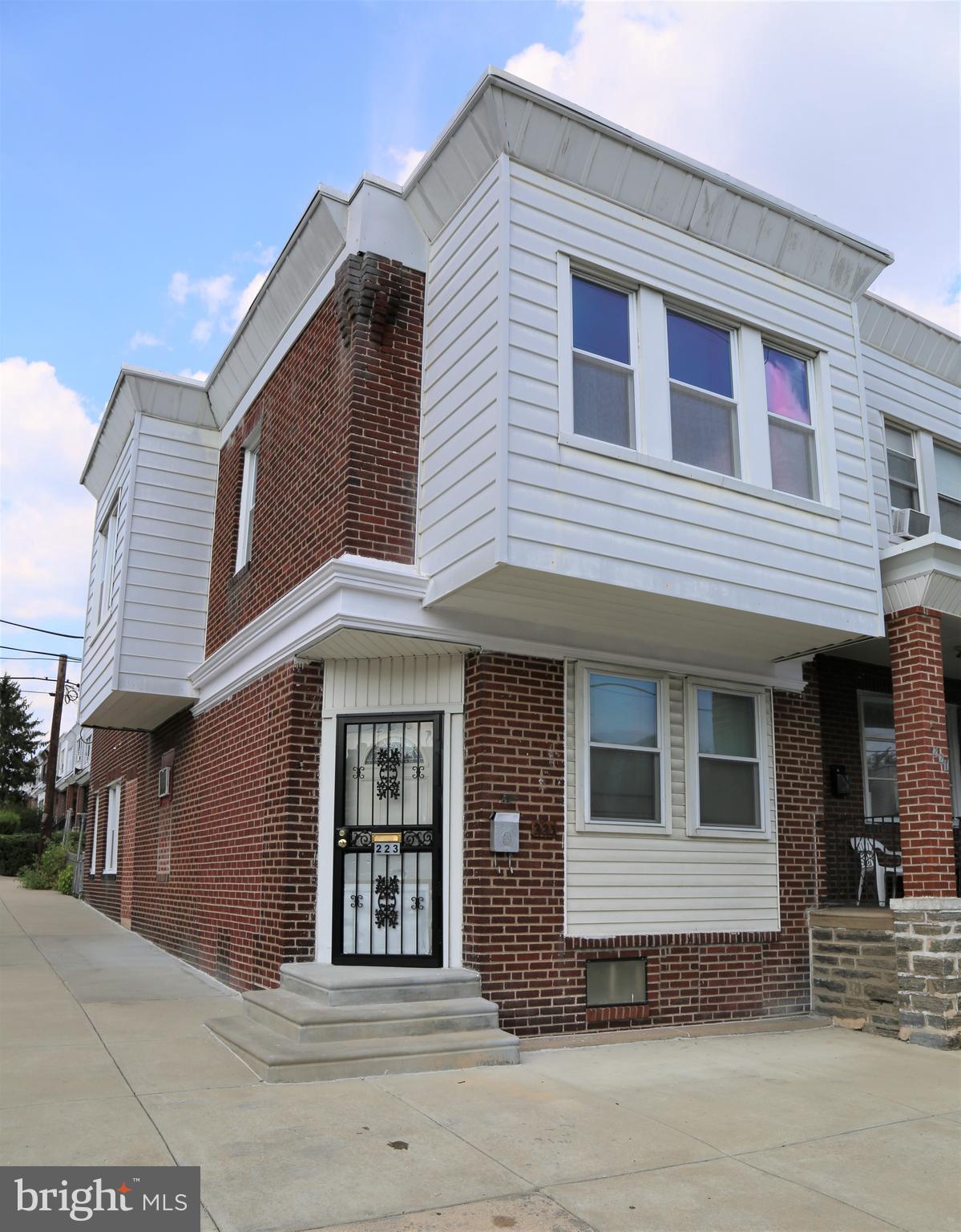 This home boasts on a very large corner! Extremely spacious with a fresh coat of paint all throughout. Enter into an openly spaced living room with laminate flooring on the first floor and original hardwood on the second floor. Modest sized kitchen includes gas stove and appliances (fridge, washer and dryer included). Each bedroom is considerable in size and will accommodate any new family or investor! This home is priced to sell!