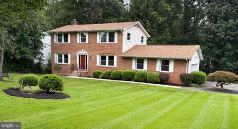 Photo of 16052 Simon Kenton Road, HAYMARKET, VA 20169 (MLS # VAPW2124076)