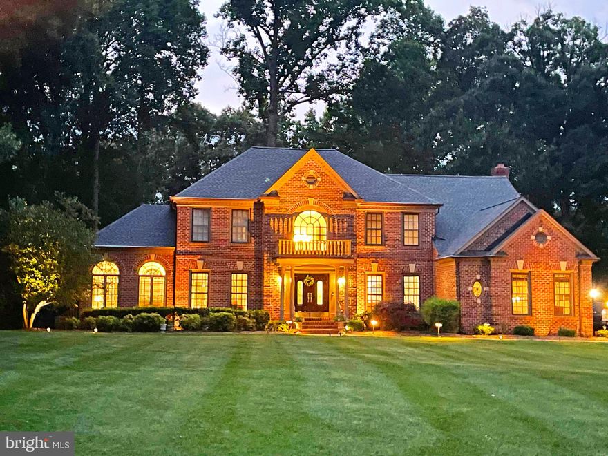 This beautiful brick colonial with a lovely curb appeal, move-in ready, located in desirable Timberlake Estates offers almost 5,000 SF of living space within a private neighborhood setting and park-like views. A two-story foyer greets you with the open floor plan. Newly updated gourmet kitchen with stainless steel appliances and large quartz countertops.  An inviting large sunroom with an attached screened in porch lets you entertain several guests. Hardwood floors throughout the first and second floors with 5 bedrooms and 5 full bathrooms. Bright living room, dining room and an office on the main level. The open and light filled Family Room features high ceilings and a gas fireplace.  Large master bedroom with walk-in closets. All bathrooms have been recently upgrades and remodeled.  The updated laundry room is also located on the second floor.  A large wet bar, a pool table room, a bonus room, and a large recreation area in the basement provides ample activity area. Main-level 3-car Garage, and a large front yard with sprinkler system, makes a remarkable setting in Great Falls.  Ten minutes to Reston, 15 minutes to Tysons, 20 minutes to Dulles International Airport.  Enjoy all that the Great Falls community has to offer - the Village center, Great Falls National Park, Nike Park, Turner Park, River Bend Park, the library, and top-rated schools in the area.