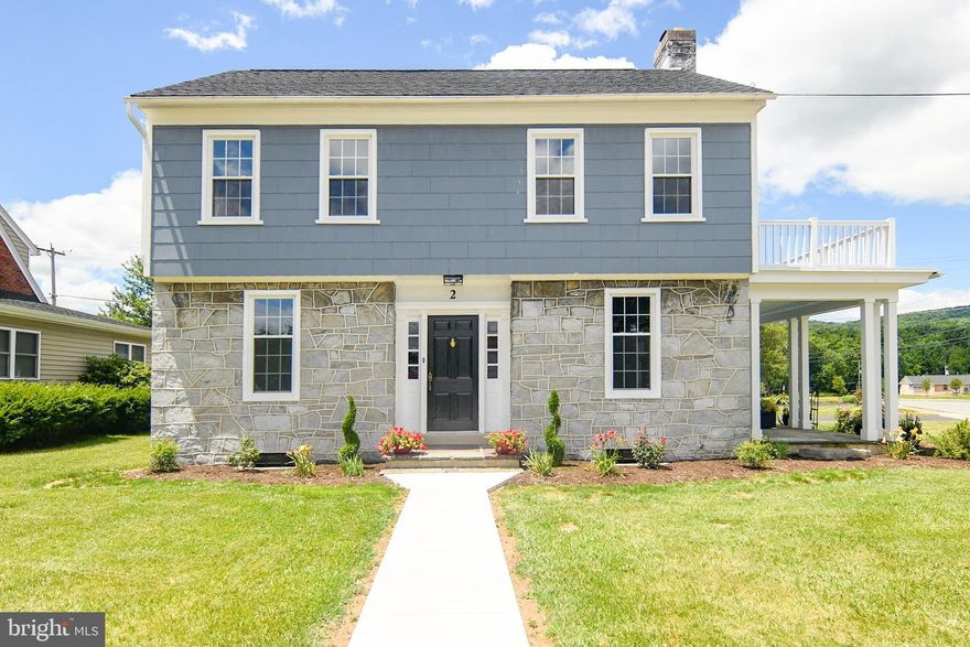 Welcome to this beautifully restored traditional home nestled in downtown Dillsburg.  Beautiful curb appeal and classic architectural details complement the interior updates and amenities, offering a perfect blend of character and comfort.  Upon entering, you are greeted by a spacious living room featuring original hardwood floors, a cozy stone fireplace and  large, 6 over 9 light windows, that fill the space with natural light.  Formal dining room adjacent to the brand new kitchen is ideal for entertaining guests or enjoying family meals. The new kitchen is definitely a highlight of the home, boasting granite counters, shaker-style, 42" upper cabinets, and stainless steel appliances. A few steps to the backdoor you'll find a covered portico and flag stone patio, the perfect sport for morning coffee. The covered  patio off the living room offers another shaded respite.   Upstairs, the primary bedroom comes complete with a private balcony.  Two additional bedrooms offer ample space. The full bathroom is updated with a large vanity, new flooring and fixtures.  Full, walkup attic provides ample storage for keepsakes.  All mechanicals are updated with a new 200 amp electric service and panel box, new wiring, new windows,  new heat pump, new roof, new balcony roof, new water heater and freshly painted inside and out.  Outside, a professionally landscaped yard offers plenty of space for gardening and outdoor activities on the 1/4 acre lot.  The huge magnolia tree is a springtime beauty in full bloom.  A detached, two-car garage provides convenient parking with an upgraded garage door and opener.  Plus, don't overlook the original chicken coop with giant windows, waiting to become a home office, she shed or a gardener's shed. Located just steps away from downtown shops, restaurants, and post office, this home offers the perfect combination of convenience and charm. Schedule your private showing today and experience the magic of this gem firsthand.