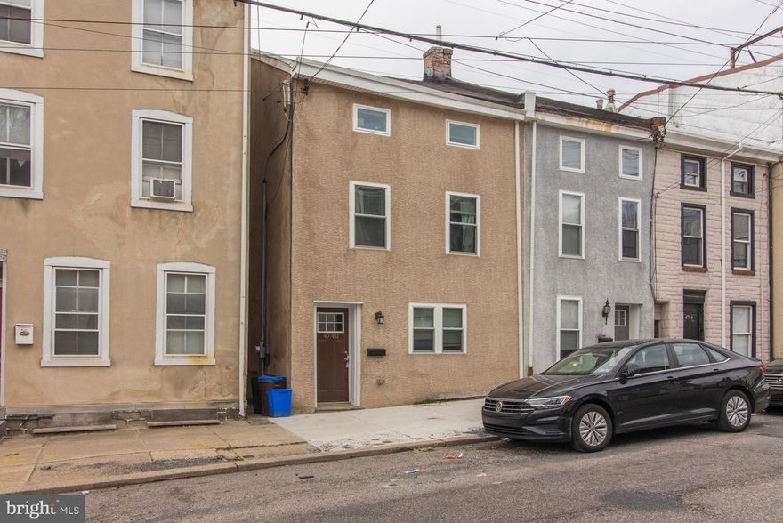 Beautifully Renovated 4-Bed, 2.5-Bath Manayunk Home with Huge Yard and Easy Parking! This fully updated 4-bedroom, 2.5-bath home offers over 2,000 square feet of stylish living space just steps from Main Street in Manayunk. The first floor features a spacious living and dining area, convenient powder room, laundry, and a modern kitchen with direct access to a massive fenced-in rear yard — perfect for entertaining or relaxing outdoors.
Upstairs, the second floor boasts two bedrooms and a full hall bath. The third floor offers two generously sized bedrooms connected by a Jack-and-Jill bathroom, ideal for flexible living arrangements. Parking is hassle-free — from Main Street, turn left onto Gates Street, then a quick right to access the large SEPTA/City-owned lot behind the home, which provides dozens of free spaces available for residents and guests. Currently rented but can be delivered vacant,  this property is a fantastic opportunity for both investors and future owner occupants. Enjoy walkability to Ivy Ridge Station and quick access to I-76, 676, and I-95. Just a short stroll to all the shops, restaurants, and nightlife Manayunk has to offer! TENANT OCCUPIED UNTIL 5/31/25.