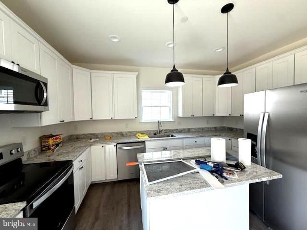 Photo of 725 220th Street, PASADENA, MD 21122 (MLS # MDAA2142950)