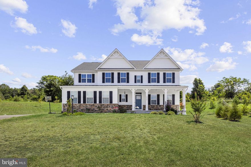 *Stunning Craftsman Colonial Built in 2023 Located in the Heart of Warrenton*Welcome to this 6 Bedroom/5 Bath home that is situated on a large .67 acre cul-de-sac lot that backs to woods. The home features beautiful stone & siding, an inviting large front porch, 2-car sideload garage and on-grid Solar Panels to save on utility bills. See Electric Bill Spreadsheet in documents section. Solar panels will be paid off ($55k) by the Sellers and owned free & clear for the new Purchaser. Sellers haven't had a Utility Bill since April, only a service fee/tax of $8.98 per month. The main level offers an open floor plan, 9 ft. ceilings, a gourmet kitchen w/ island, pendant lights, custom 42" cabinets, soft-close drawers, quartz counters, tile backsplash, stainless steel appliances, pantry, breakfast bar, dining and a huge family room. There is a huge library w/ french doors that could be used as a formal living or dining room.  There is a main level bedroom w/ attached full bath for guests/in-law suite that could be used as a library. There are luxury vinyl plank floors on the main and upper levels and recessed lights throughout. The upper level boasts an Owners Suite w/ tray ceiling, a large walk-in closet and sumptuous Owners Bath featuring two sinks, water closet and an oversized shower offering dual shower heads & frameless glass. There is a loft, 3 more generously sized bedrooms, 2 full baths and a laundry room on the upper level. Expand in the fully finished basement that offers plenty of space to entertain, a 6th bedroom, full bath and plumbing rough-in for future kitchen/wetbar. Additional options include LVP wood floor stairwell, tilt windows and 75-gallon hot water heater. Govee permanent color changing holiday lights installed along the roofline. Remainder of 10-yr Builder Structural Warranty transfers to new homeowner. Warrenton Chase is a wonderful Subdivision offers homes on larger lots and is located just minutes to downtown, restaurants, shops, dog park, Rady Park, the Warf, etc. The list of amenities includes a community pool, kiddie pool, playground, tennis courts, jog/walk path. Commuter parking lot is 3 miles away. A Must See!