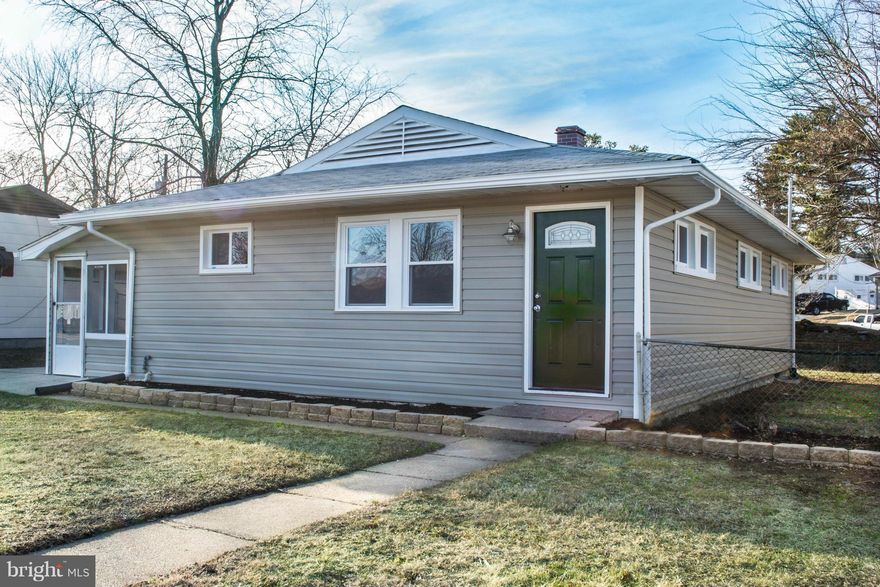 Delightful Remodeled Ranch is much bigger than it appears from the road. Fenced backyard. Driveway for at least two cars.  Freshly painted,  new oak hardwood floors, SS Appliances, Granite counters, New Kit Cabinets, Screened  porch,  New windows. The huge finished  basement spans the entire house & has a full bath & BR/office. Over 2000 sq ft finished living space. Perfect for a daycare business
