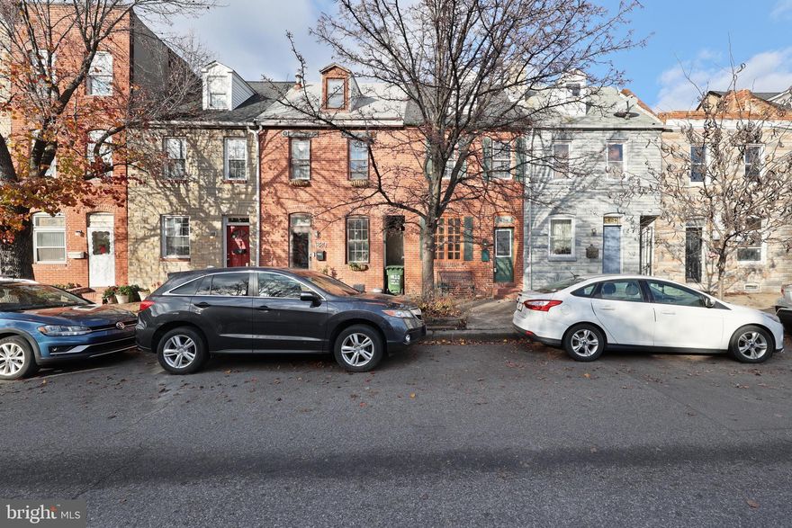 Welcome to 1822 Bank St. conveniently located to both Fells Point & Canton Square.  Walk right into this updated home and enjoy the open concept floor plan, hardwood floors throughout, tons of windows providing lots of natural sunlight, original built-in shelving, original exposed brick, crown molding and recessed lighting to illuminate every inch of this home!  The large, eat-in kitchen includes beautiful oak custom cabinets with soft-close and pull-out finish, granite counter tops, stainless steel appliances, mosaic backsplash and ceramic tile flooring.  The upper levels have 3 spacious bedrooms including an owner suite with a beautiful deck right off the bathroom area.  Brand new roof installed 2022 and so much more.   The beauty and charm this home offers make it a stand out as well as it being very walkable to work, many restaurants, bars, shops and the Fells Point waterfront.  Sold As-Is.