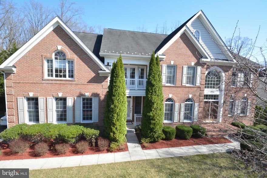 Estate home in sought-after neighborhood with every add-on, offering about 7400 square feet of light-filled space on 3 levels. Amazing curb appeal, mature plantings, garden, metal fencing and  walkway greet you as you approach the brick porch. You enter through elegant double doors to the two-story entry with gleaming hardwood flooring that spans the entire main level. A bright and airy Living Room flanks the Foyer and features crown molding, Chair Rails and offers views of the front garden. The spacious Study is ideal for working from home and offers relaxing views of front garden. Entertain in style in the enormous Dining Room with gorgeous architectural details, chair rail and crown molding, Serve cocktails from the large Butler's Pantry with access to the Dining Room and Kitchen. This home is an entertainer's delight! The gourmet Kitchen offers plenty of island space as well as a gas cooktop. An abundance of handsome Cabinetry, granite countertops and pantry provide plenty of storage and prep space. A desk enables you to keep everything organized. The large Breakfast Room opens to the multi-level deck and is wide open to the Great Room. The dramatic two-story Great Room enjoys a soaring wall of windows with nice views of the backyard and a second staircase to the upper level. The Upper Level offers an enormous Owner's Suite with Sitting Room, stunningly large walk in closet, dressing area with optional private balcony (overlooking the front garden) and renovated, luxurious spa-like bath. The renovated Owner's Bath features a Garden tub surrounded by windows, separate shower with seamless glass enclosure, dual vanities and private water closet. Three spacious ancillary bedrooms each offering private baths, and enjoy walk-in closets. A large Laundry Room is conveniently located on the main level with access to covered porch and front garden. The walk out Lower Level offers a Media Room, Family Room, Recreation Area w/ full wet bar, Study space as well as a Bedroom with adjacent Full Bath. A workshop and 2 large storage rooms round out the Lower Level.  This home has been loved and cherished and eagerly awaits its new owners. Outside, enjoy the gardens, throw up a swing set or put in a fire pit. Enjoy the expansive backyard from  the multi-level deck with Gazebo. All this, just minutes from shopping, restaurants, major commuter routes. Woodson HS and Frost Middle School. Enjoy your new home! See video at http://impacttour.com/index.php/4753-briggs/