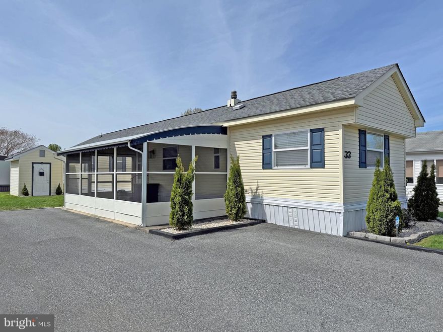 East is located in the "Midway" area of Rehoboth, so you'll be an equal distance - about 4 miles - to the Rehoboth boardwalk or the Lewes public beach! And there is a water park, movie theater, fitness center with racquetball, and restaurants just a short distance from the community. You can hop on the DART bus, too, to reach the beaches. Freshly painted and nicely updated! This 1981 Ritz Craft Fashion Craft-model home features a split bedroom plan, so it is like having two main suites. The living room opens to the spacious kitchen. The kitchen has a large, curved breakfast bar and space for a dinette set. There is also a built-in buffet in the dining area for your fancy dishes. Kitchen appliances include a smooth-top electric range, a range hood and a fridge (there’s a base cabinet next to the sink that could be fit a dishwasher, if you want to add one). The laundry area, with a full-size washer and dryer, is next to the kitchen. The main bedroom is to the rear of the home and it has a walk-in closet and is en Suite. That bath has a large garden tub/shower. The second full bath has a hall entry door and a private doorway from the second bedroom to give it that “en Suite” feeling. That bath has a standard tub/shower. The second bedroom has double closets, so there is plenty of storage space. Some newer sub-flooring & flooring. HVAC PAC unit (new Dec. 2025). Water heater is approx. 4 years old. Replacement windows. 10’x20’ SilverTop screened porch for great outdoor living space. Storage shed. Property is subject to a transferrable, annually-renewable leasehold interest: Lot Rent is approx. $958/mt. (renews annually with any increases capped as per 25 Del. C. Sec. 7050-7054). Lot rent includes membership to the outdoor pool. Trash/recycle and the State’s Relocation Trust Fund (RTF) are extra fees are added to the base lot rent. Buyer pays electric, water, sewer & metered gas (LP). A Park application is required, and a Buyer will be accepted as a Resident based on the following criteria: 1.)income verification, 2.)credit bureau score, plus evaluation of debt-to-income ratio, and 3.)criminal background check. (Note: Rentals are NOT permitted in this community - but friends & family may always visit.) Financing may be available to qualified borrowers from a few Lenders that specialize in installment/chattel loans for mobile/manufactured homes on leased land. Closing costs include a real estate transfer tax (3.75% DMV Doc Fee) & a Settlement Agent fee.
