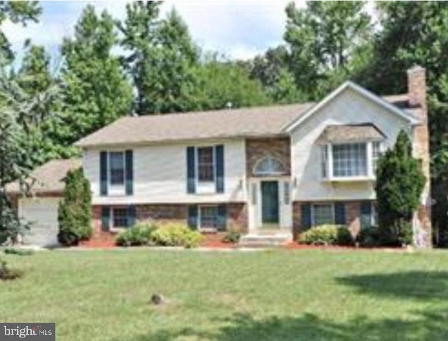 OFFER DEADLINE tomorrow Monday January 15th at 5pm.

Welcome to this lovely single-family home in the peaceful neighborhood of Glenn Dale, MD—a perfect fit for a growing family or savvy investors. With 4 bedrooms and 3 full baths, this home offers a warm and inviting space.

Upstairs, you'll find beautiful hardwood floors and ceiling fans throughout, ensuring a comfortable living environment. The spacious eat-in kitchen is a highlight, featuring stainless steel appliances, granite countertops, plenty of cabinets, and a full-size pantry. Step out onto the deck off the kitchen and enjoy the view of the woods.

Large bay windows bring natural light into the living areas, creating a welcoming atmosphere. The lower level adds versatility with a large bedroom, an extra-large full bathroom with a jacuzzi tub and stand-alone shower, a recreation room with a fireplace, and an office with a window. The laundry room includes a washer and dryer, and there's plenty of storage space.

Convenience is key with a lower-level entry/exit, and the property offers a one-car garage with a driveway that can accommodate 4 additional cars. If you have future plans for expansion, there's acreage available for potential build-out projects.

This home is being sold AS-IS and comes with a Cinch 1-year home warranty for added peace of mind. Don't miss the chance to make this comfortable and functional residence your own—a perfect blend of homey vibes and investment potential.